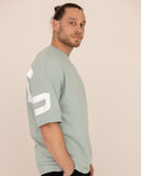 Men oversized green t-shirt side view