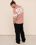 Men oversized pink t-shirt back view