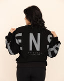 women oversized black sweatshirt back view
