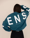 women oversized blue sweatshirt back view