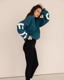 women oversized blue sweatshirt side view