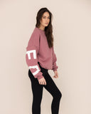 women oversized rose sweatshirt side view