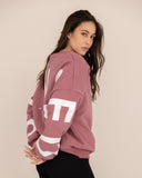 women oversized rose sweatshirt side view