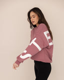 women oversized rose sweatshirt side view
