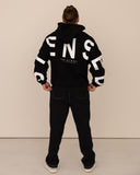 men oversized black hoodie back view