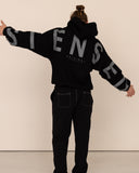 Men oversized black hoodie back view