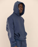 Men oversized blue hoodie side view