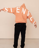 Men oversized peach hoodie back view