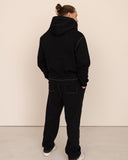 Men black pants back view