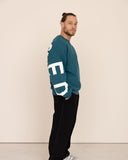 Men oversized blue sweatshirt side view