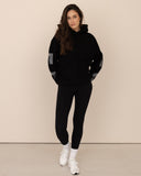 Women oversized black hoodie front view