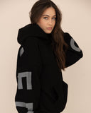 Women oversized black hoodie side look view