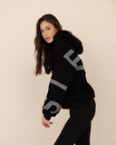 Women oversized black hoodie side view