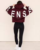 Women oversized burgundy hoodie back view