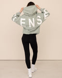 Women oversized green hoodie back view