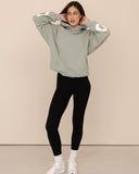 Women oversized green hoodie front view