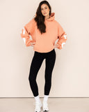 Women oversized orange hoodie front view