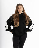 women oversized black hoodie front view