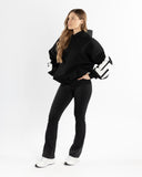 women oversized black hoodie front view