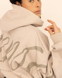 women oversized beige hoodie side view
