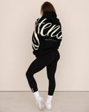 women oversized black hoodie back view