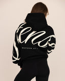 women oversized black hoodie back view