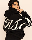 women oversized black hoodie back view