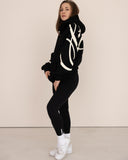 women oversized black hoodie side view