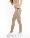 Women beige legging side view