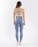 Women blue legging back view