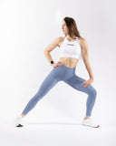 Women blue legging mouvement view