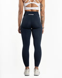 Women blue legging back view