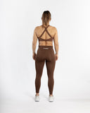 Women black legging back view