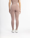 Women pink legging back view