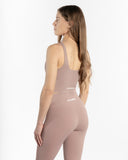 Women pink legging back side view
