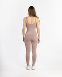 Women pink legging back view