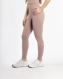 Women pink legging side view