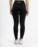 Women black legging pocket back view