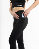 Women black legging pocket side view