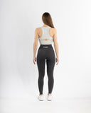Women charcoal legging pocket back view