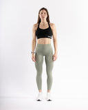 Women green legging pocket front view