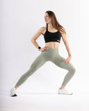 Women green legging pocket mouvement view