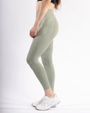 Women green legging pocket side view