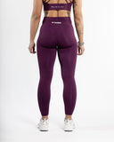 Women purple legging back view