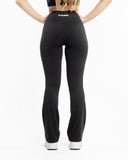 Women black flare legging back view 