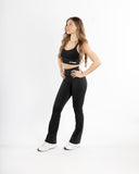 Women black flare legging side view 