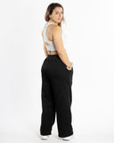 women oversized black pantalon back view