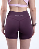 women purple short view