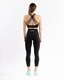 Women black sport bra straps back view