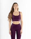 Women violet sport bra straps front view